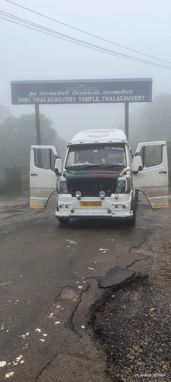 Mayon Traveller vehicle with doors open at a temple tour stop